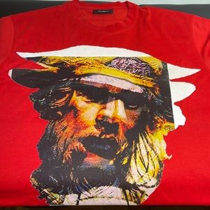 Used like new but has a small black dot stain in front under the collar area